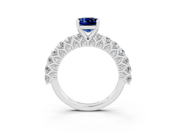 Silver Cushion Cut Blue Sapphire Solitaire Ring with Shared Prong Pavé Band and Four-Prong Setting