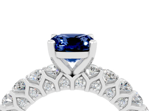 White gold Cushion Cut Blue Sapphire Solitaire Ring with Shared Prong Pavé Band and Four-Prong Setting_4