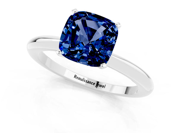 Silver Cushion Cut Blue Sapphire Solitaire Ring with Six-Prong Setting and Classic Band