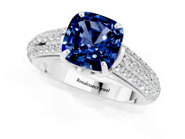 Platinum Cushion Cut Blue Sapphire Solitaire Ring with Three-Row Pavé Band and Four-Prong Setting