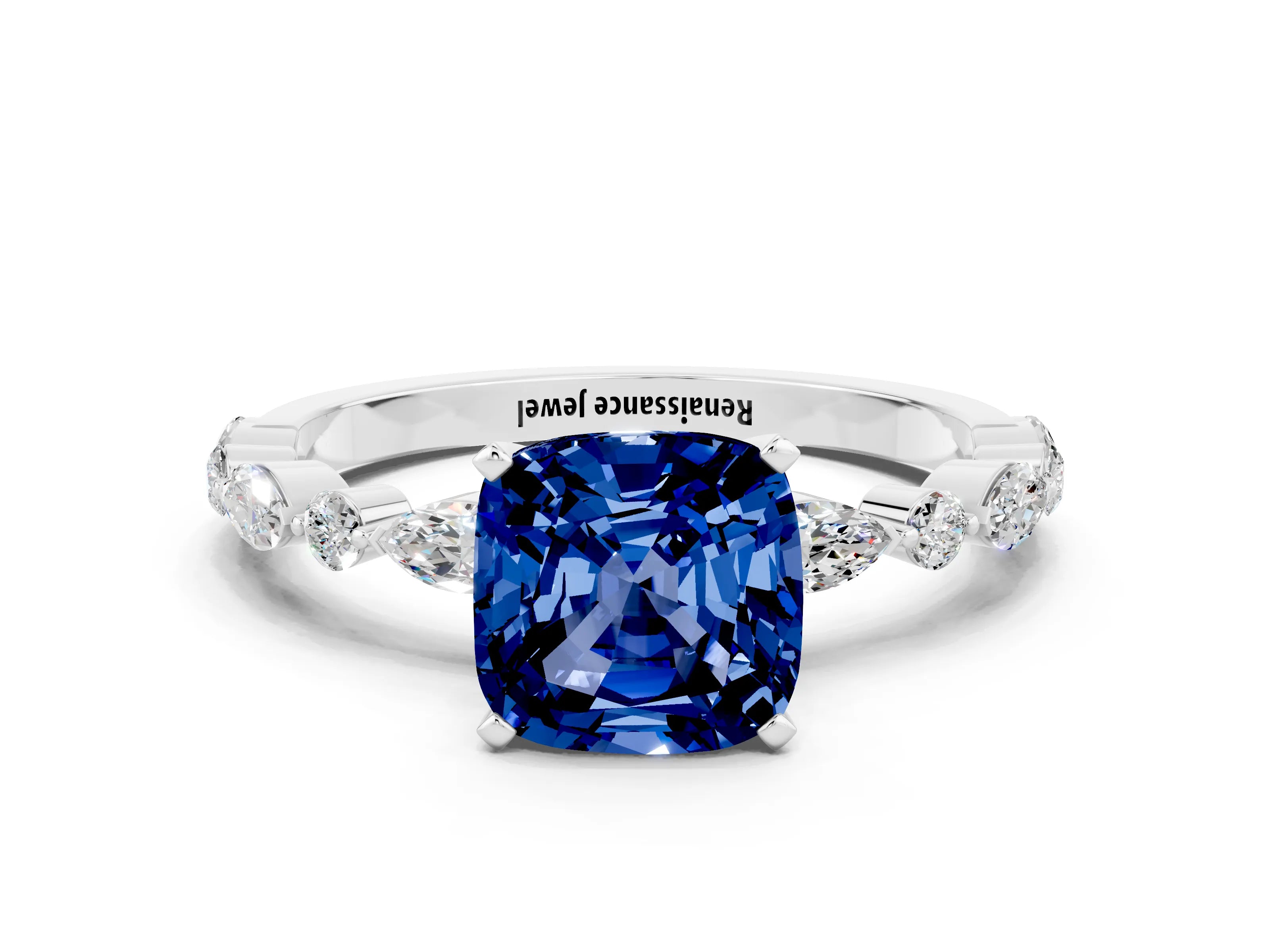 White gold Cushion Cut Blue Sapphire Solitaire with Side Stones on a Pavé Band and Four-Prong Setting