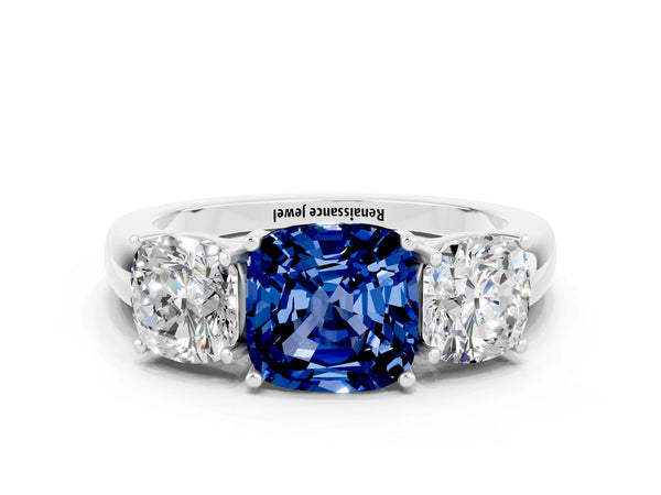 Silver Cushion Cut Blue Sapphire Three-Stone Ring with Four-Prong Setting and Classic Band