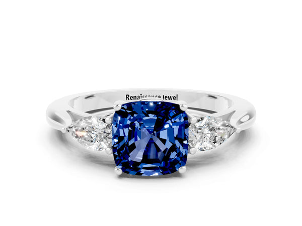 Silver Cushion Cut Blue Sapphire Three-Stone Ring with Pear  Side Stones and Prong Setting