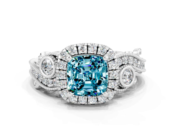 Platinum Cushion Cut Blue Topaz Halo Ring with Milgrain Pavé Band and Four-Prong Setting