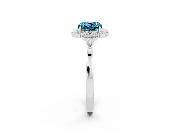 Platinum Cushion Cut Blue Topaz Halo Ring with Pear Side Stones and Prong Setting