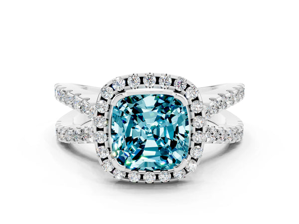 Silver Cushion Cut Blue Topaz Halo Ring with Split Shank Pavé Band and Prong Setting