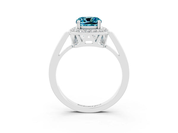Platinum Cushion Cut Blue Topaz Halo Ring with Split Shank and Four-Prong Setting