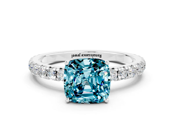 Platinum Cushion Cut Blue Topaz Pavé Solitaire Engagement Ring with Four-Prong Setting