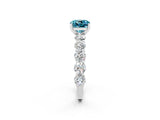 White gold Cushion Cut Blue Topaz Prong Setting with Side Stones on a Pave Band_2