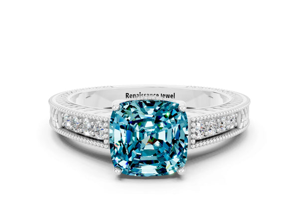 White gold Cushion Cut Blue Topaz Ring with Milgrain Pavé Band and Four-Prong Setting