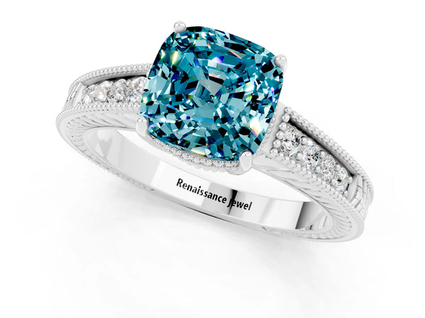Silver Cushion Cut Blue Topaz Ring with Milgrain Pavé Band and Four-Prong Setting