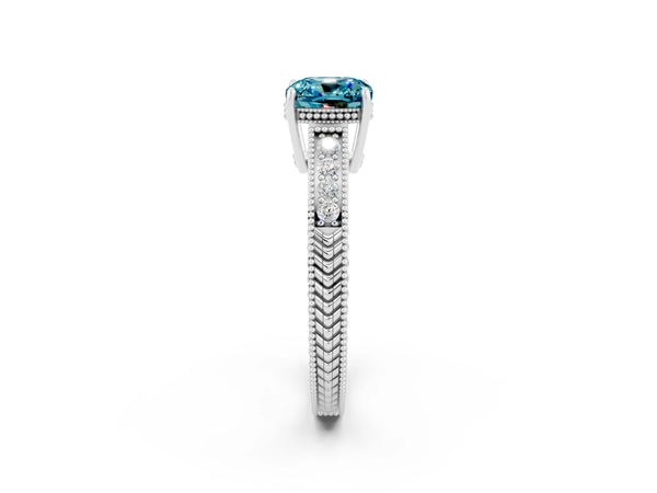 Silver Cushion Cut Blue Topaz Ring with Milgrain Pavé Band and Four-Prong Setting