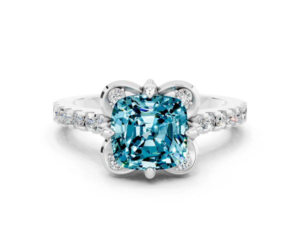 Platinum Cushion Cut Blue Topaz Ring with Pavé Band and Floral Prong Setting