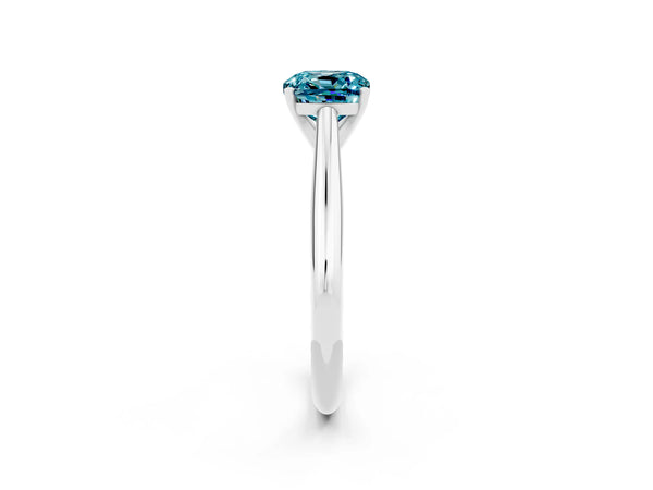Platinum Cushion Cut Blue Topaz Solitaire Engagement Ring with Cathedral Setting and Four-Prong Mount