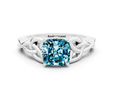 White gold Cushion Cut Blue Topaz Solitaire Engagement Ring with Celtic Knot Band and Four-Prong Setting