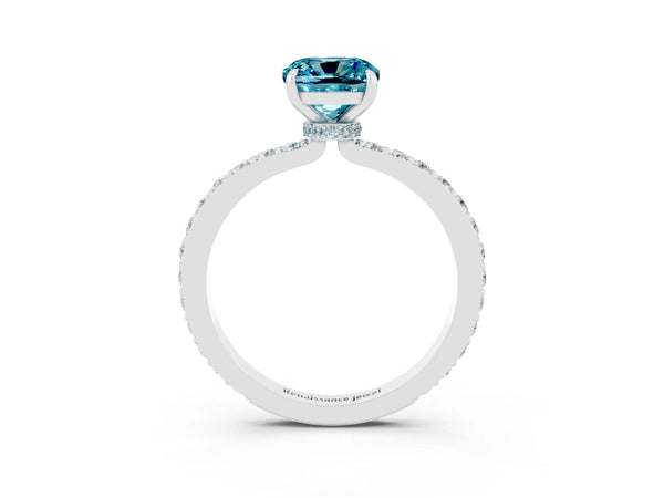 Platinum Cushion Cut Blue Topaz Solitaire Engagement Ring with Pavé Band and Four-Prong Setting