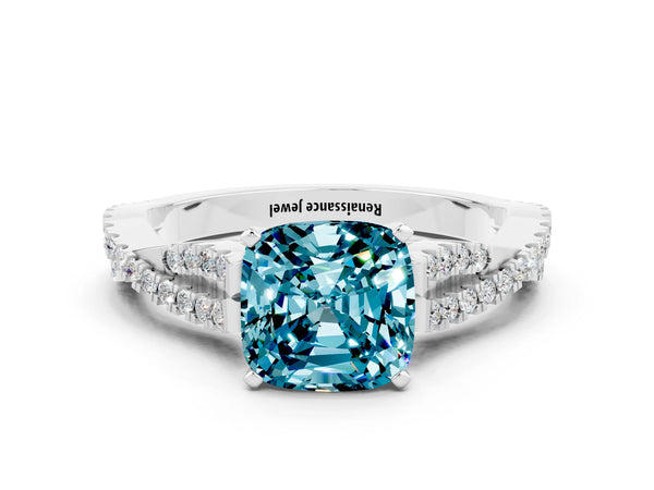 Platinum Cushion Cut Blue Topaz Solitaire Engagement Ring with Twisted Pavé Band and Four-Prong Setting