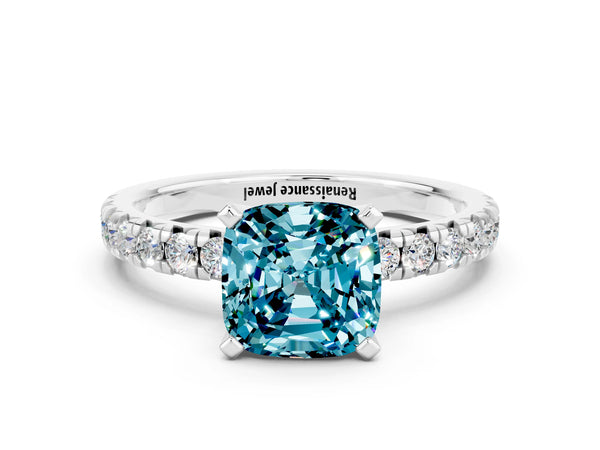 Platinum Cushion Cut Blue Topaz Solitaire Pavé Engagement Ring with Round Band and Prong Setting