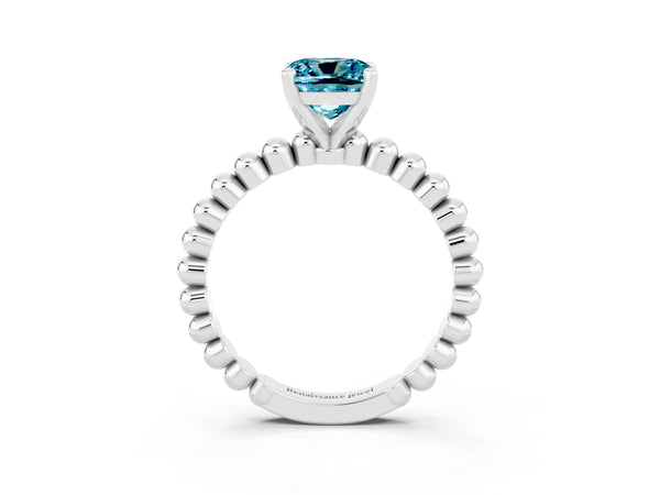 Platinum Cushion Cut Blue Topaz Solitaire Ring with Beaded Band and Prong Setting