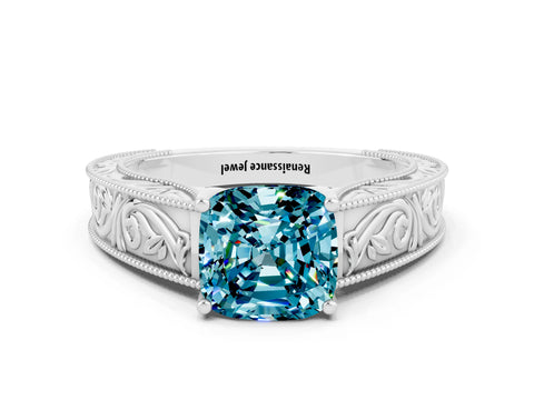 White gold Cushion Cut Blue Topaz Solitaire Ring with Engraved Band and Four-Prong Setting