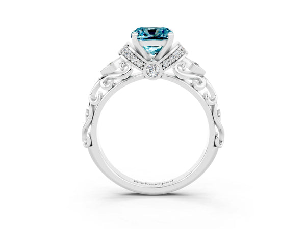 Platinum Cushion Cut Blue Topaz Solitaire Ring with Filigree Band and Four-Prong Setting