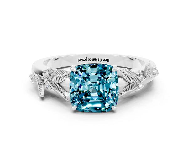 White gold Cushion Cut Blue Topaz Solitaire Ring with Leaf Motif Band and Four-Prong Setting