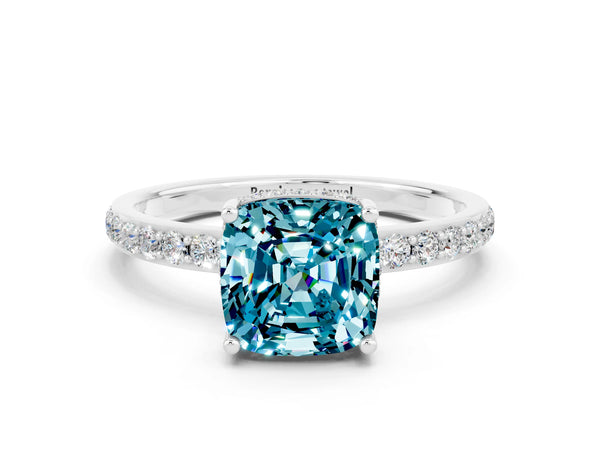 Platinum Cushion Cut Blue Topaz Solitaire Ring with Pavé Band and Hidden Halo