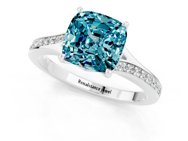 Platinum Cushion Cut Blue Topaz Solitaire Ring with Pavé Band and Prong Setting