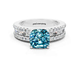 White gold Cushion Cut Blue Topaz Solitaire Ring with Pavé and Channel Set Band