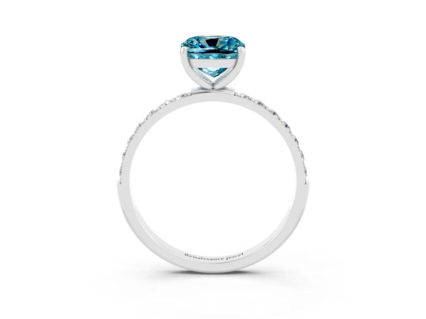 Platinum Cushion Cut Blue Topaz Solitaire Ring with Round  Pavé Band and Prong Setting
