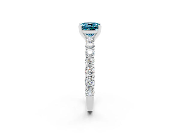 Silver Cushion Cut Blue Topaz Solitaire Ring with Shared Prong Pavé Band and Four-Prong Setting