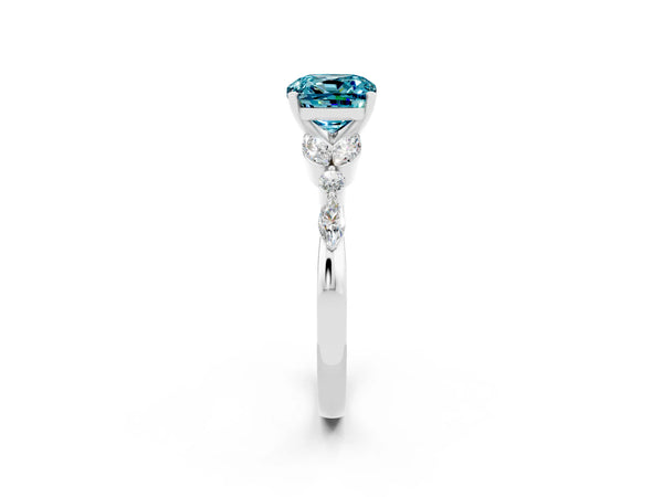 Platinum Cushion Cut Blue Topaz Solitaire Ring with Side Stones and Four-Prong Setting