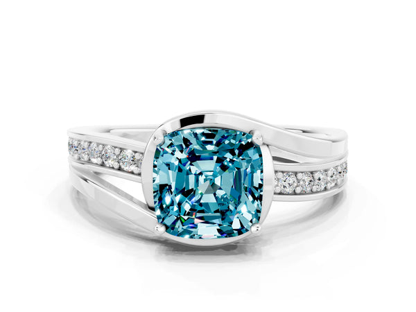 Platinum Cushion Cut Blue Topaz Solitaire Ring with Split Shank and Prong Setting