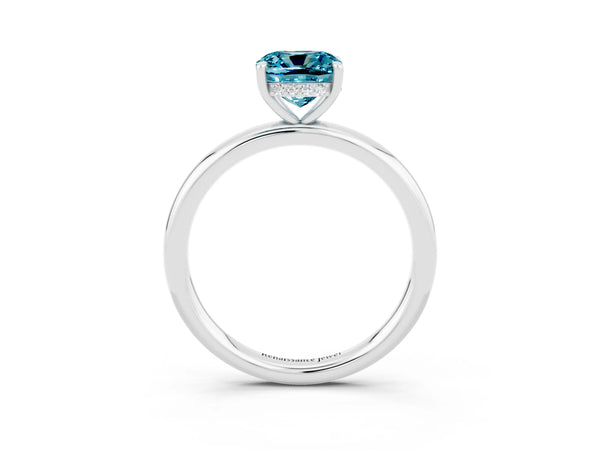 Silver Cushion Cut Blue Topaz Solitaire Ring with Thin Band and Four-Prong Setting