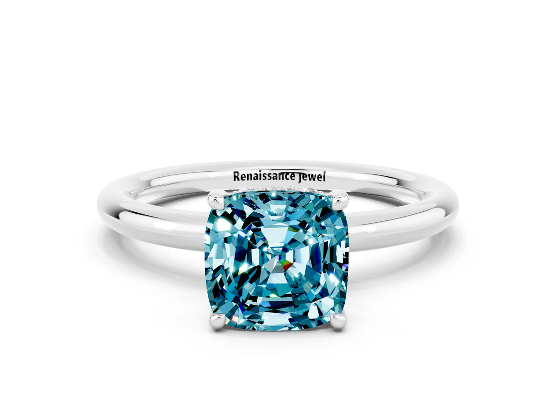 White gold Cushion Cut Blue Topaz Solitaire Ring with Thin Band and Four-Prong Setting