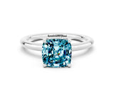White gold Cushion Cut Blue Topaz Solitaire Ring with Thin Band and Four-Prong Setting