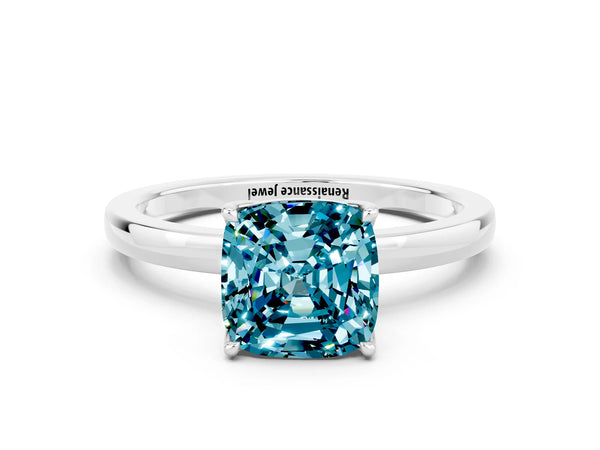 Platinum Cushion Cut Blue Topaz Solitaire Ring with Thin Band and Prong Setting