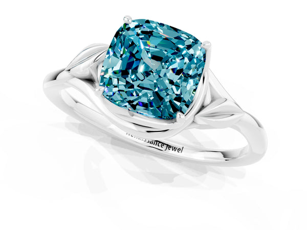 Silver Cushion Cut Blue Topaz Solitaire Ring with Twist Band and Four-Prong Setting
