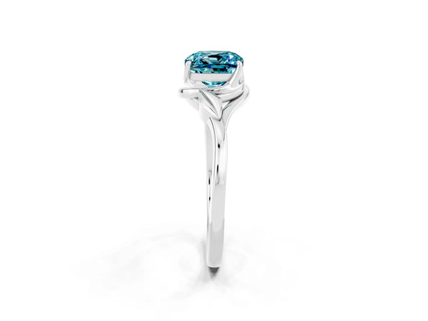 Silver Cushion Cut Blue Topaz Solitaire Ring with Twist Band and Four-Prong Setting