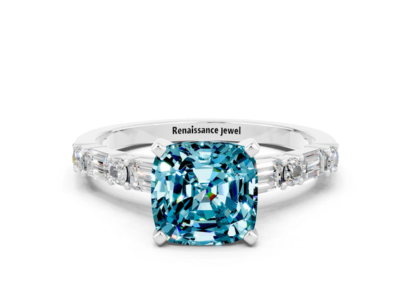 Platinum Cushion Cut Blue Topaz Solitaire with Side Baguettes and Channel Set Band