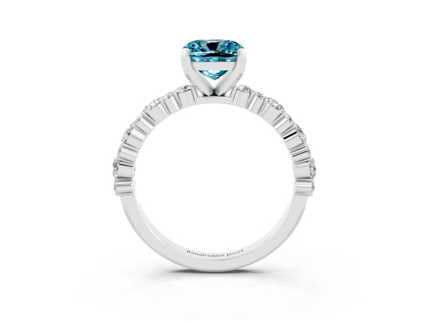 Platinum Cushion Cut Blue Topaz Side Stone Solitaire Ring with Round  and Four-Prong Setting