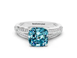 White gold Cushion Cut Blue Topaz Split Shank Engagement Ring with Pavé Band