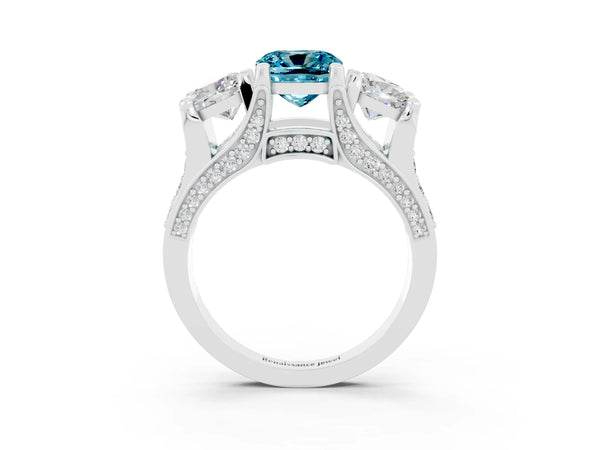 White gold Cushion Cut Blue Topaz Three-Stone Ring with Channel Set Band and Four-Prong Setting