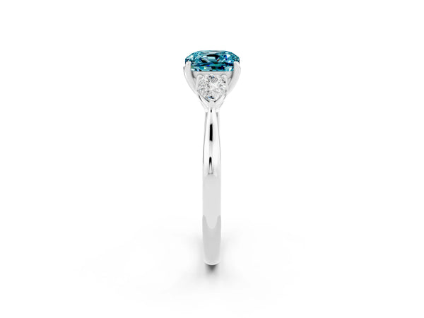 Platinum Cushion Cut Blue Topaz Three-Stone Ring with Pear  Side Stones and Prong Setting