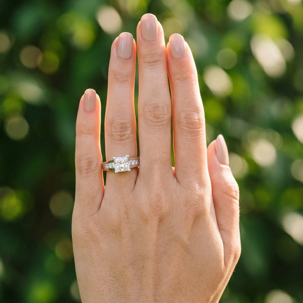 White gold Cushion Cut Channel Set Solitaire Ring with Four-Prong Setting