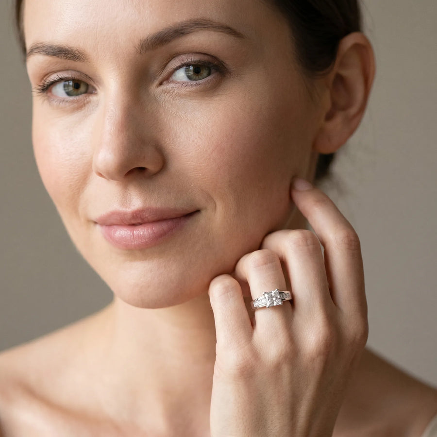 White gold Cushion Cut Channel Set Solitaire Ring with Four-Prong Setting