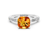 White gold Cushion Cut Citrine Solitaire with Side Baguettes and Channel Set Band