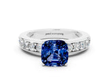 White gold Cushion Cut Cut Channel Set Diamond Engagement Ring with Four-Prong Setting
