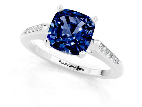 Silver Cushion Cut Blue Sapphire Solitaire Ring with Channel Set Round  Band and Prong Setting