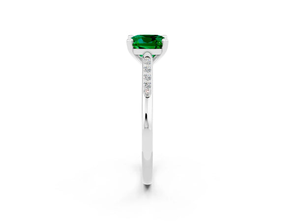 Platinum Cushion Cut Emerald Solitaire Ring with Channel Set Round  Band and Prong Setting